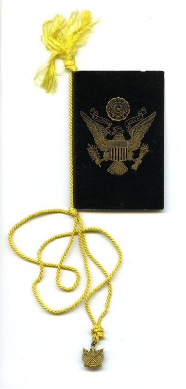 Black cover printed with University seal and U.S. coat of arms. Gold cord and tassel with eagle charm bearing words "1937 Michigan."