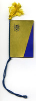 Blue and gold cover with University shield and motto. Blue cord and yellow tassel. 